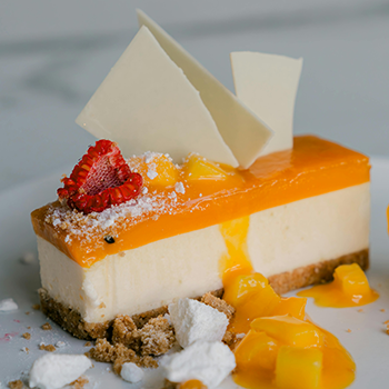 slice of mango cheesecake